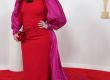 Мелиса Маккарти придаде блясък на стария Холивуд в червена рокля с пурпурни ръкави. Актьорът се допълни с бижута Dena Kemp